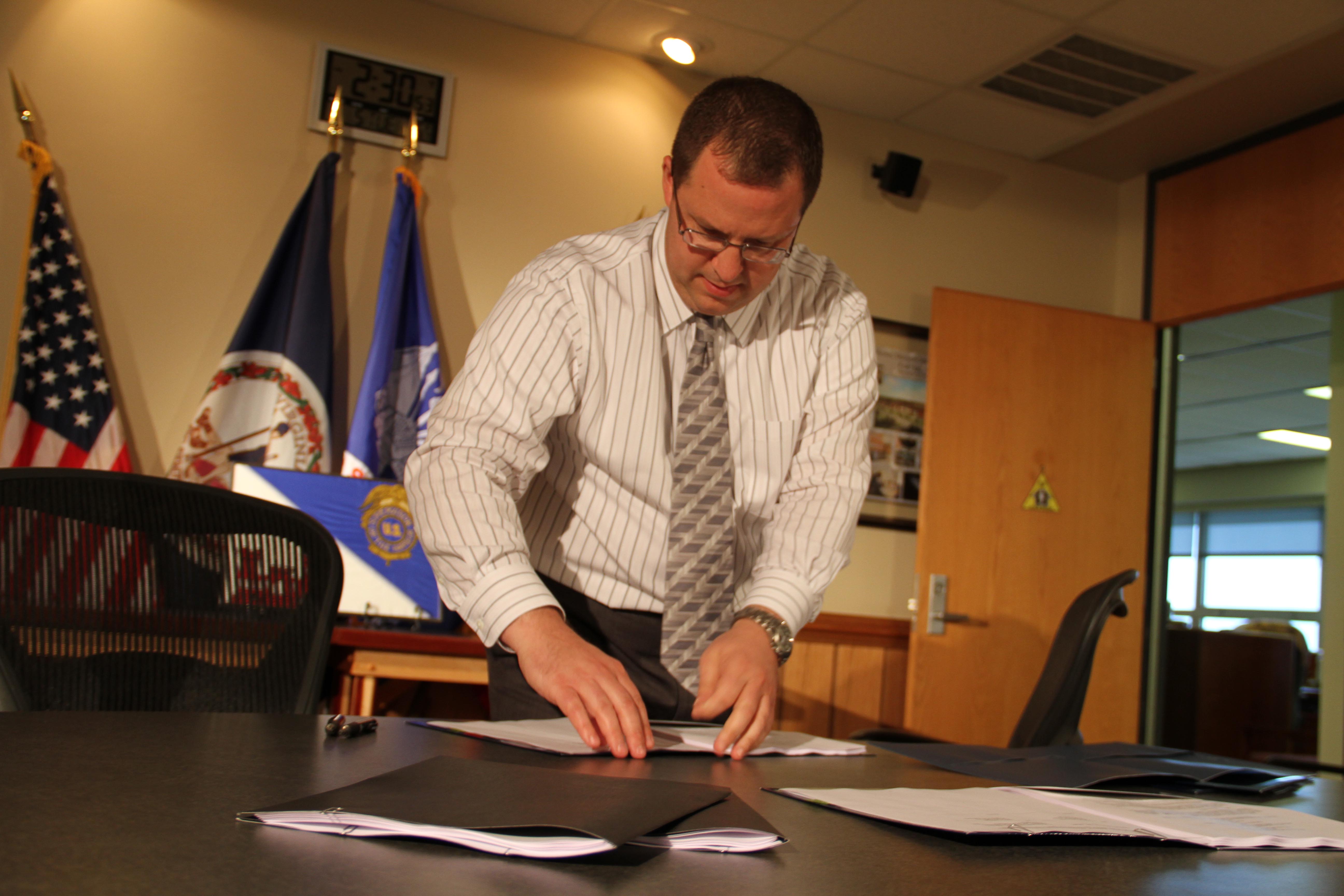 Image of Corps employee preparing documents